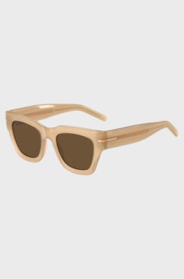 Lunettes de soleil en ac&eacute;tate beige avec d&eacute;tail dor&eacute; embl&eacute;matique, Beige