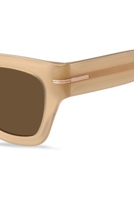 Lunettes de soleil en ac&eacute;tate beige avec d&eacute;tail dor&eacute; embl&eacute;matique, Beige