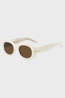 White-acetate sunglasses with signature gold-tone detail, White