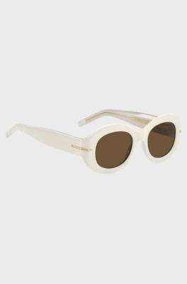 White-acetate sunglasses with signature gold-tone detail, White