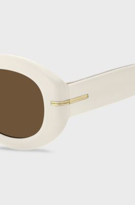 White-acetate sunglasses with signature gold-tone detail, White