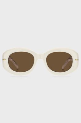 White-acetate sunglasses with signature gold-tone detail, White