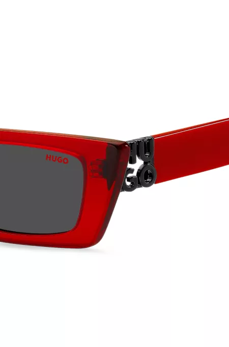 Red-acetate sunglasses with 3D monogram