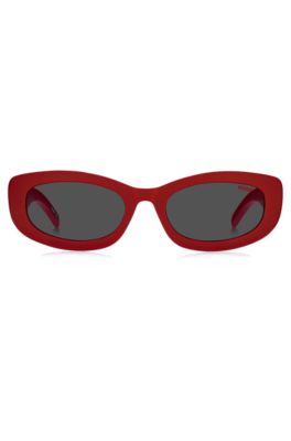 Red sunglasses with branded temples, Red