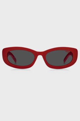 Red sunglasses with branded temples, Red