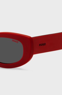 Red sunglasses with branded temples, Red