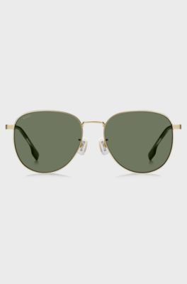 Gold-tone sunglasses with titanium temples, Gold