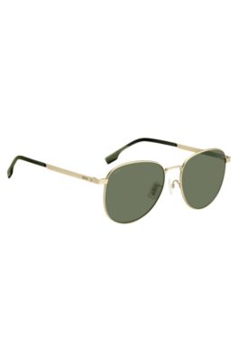 Gold-tone sunglasses with titanium temples, Gold