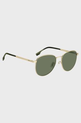Gold-tone sunglasses with titanium temples, Gold