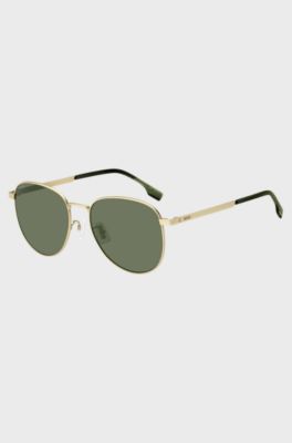 Gold-tone sunglasses with titanium temples, Gold