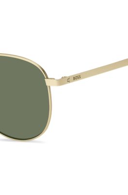 Gold-tone sunglasses with titanium temples, Gold