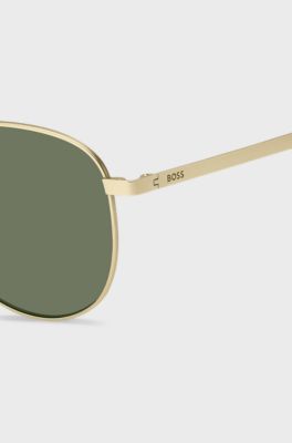 Gold-tone sunglasses with titanium temples, Gold