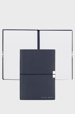 A6 notebook in navy faux leather with elasticated band, Dark Blue