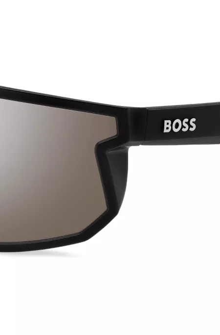 Black mask-style sunglasses with branded temples