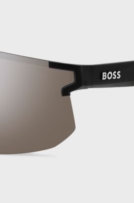 Black mask-style sunglasses with branded temples and bridge, Black