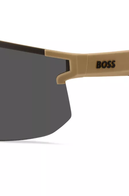 Camel mask-style sunglasses with branded temples and bridge