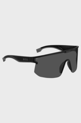 Black mask-style sunglasses with branded temples and bridge, Black