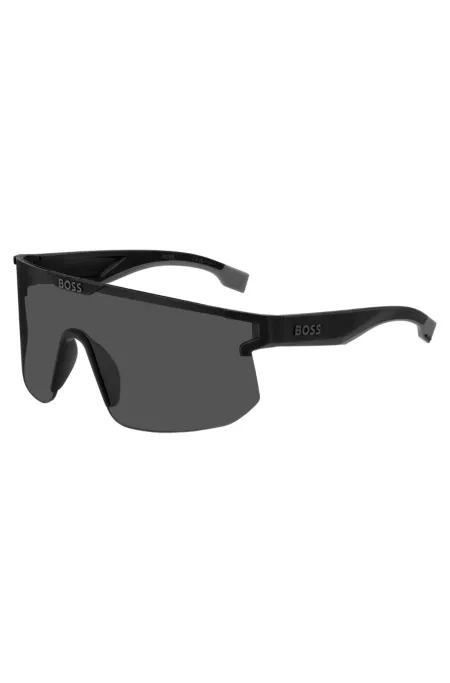 Black mask-style sunglasses with branded temples and bridge