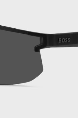 Black mask-style sunglasses with branded temples and bridge, Black