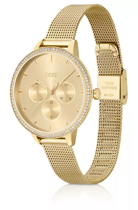 Gold-effect watch with crystal-set bezel