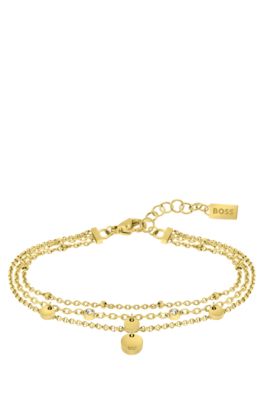 Multi-strand bracelet with medallions and crystals, Gold tone