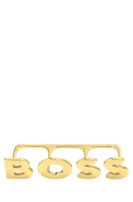 Light-golden-plated knuckle ring with logo letters, Gold tone