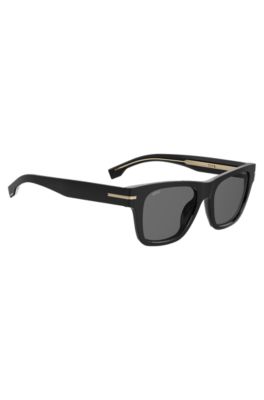 Schwarze Sonnenbrille mit goldfarbenen Details, Schwarz