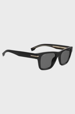Black sunglasses with gold-tone details, Black