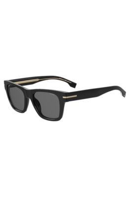 Schwarze Sonnenbrille mit goldfarbenen Details, Schwarz