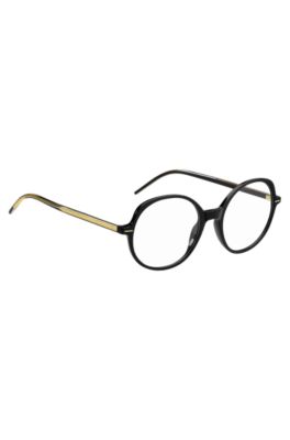 Optical frames in black acetate with gold-tone details, Black