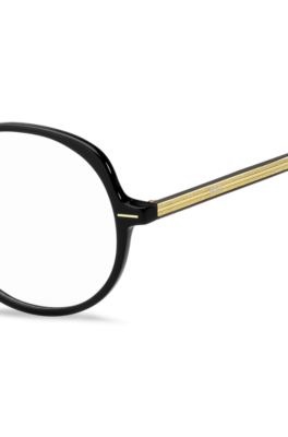 Optical frames in black acetate with gold-tone details, Black