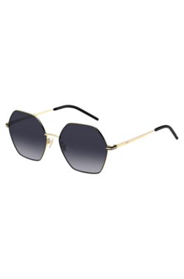 Angular sunglasses in black and gold-tone steel, Gold