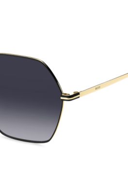 Angular sunglasses in black and gold-tone steel, Gold