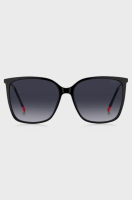 Black sunglasses with logo details and red end-tips, Black