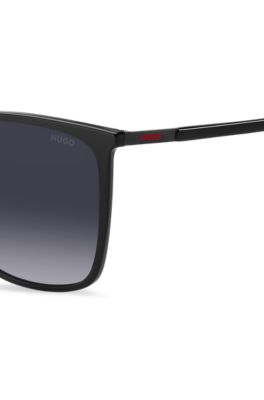 Black sunglasses with logo details and red end-tips, Black
