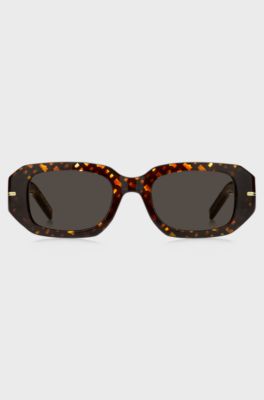 Occhiali da sole in acetato con monogrammi, A disegni