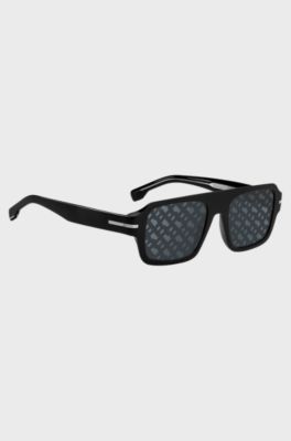 Black-acetate sunglasses with monogram-patterned lenses, Black