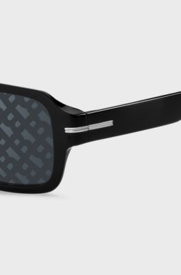 Black-acetate sunglasses with monogram-patterned lenses, Black