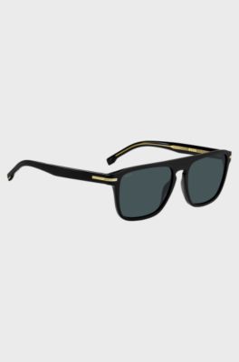 Black-acetate sunglasses with gold-tone details, Black