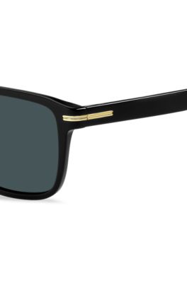 Black-acetate sunglasses with gold-tone details, Black