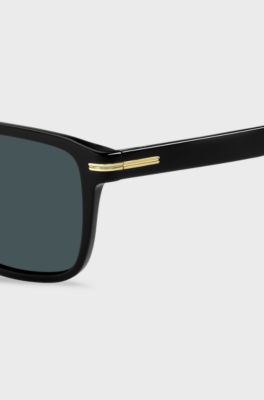 Black-acetate sunglasses with gold-tone details, Black