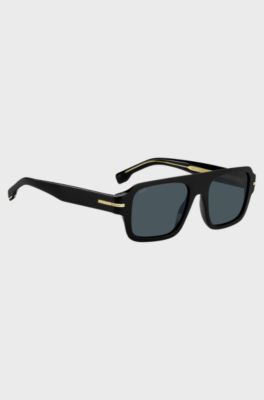 Black-acetate sunglasses with signature hardware, Black