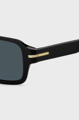 Black-acetate sunglasses with signature hardware, Black