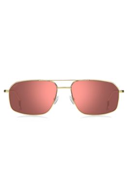 Goldfarbene Sonnenbrille mit rosafarbenen Gl&auml;sern, Gold