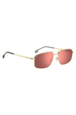 Goldfarbene Sonnenbrille mit rosafarbenen Gl&auml;sern, Gold