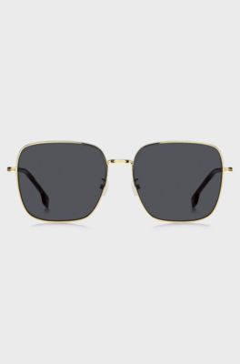 Gold-tone sunglasses with signature hardware, Gold