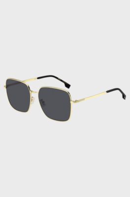 Gold-tone sunglasses with signature hardware, Gold