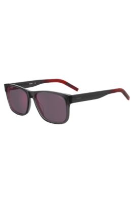 Sonnenbrille aus transparentem Acetat in Grau und Rot, Grau