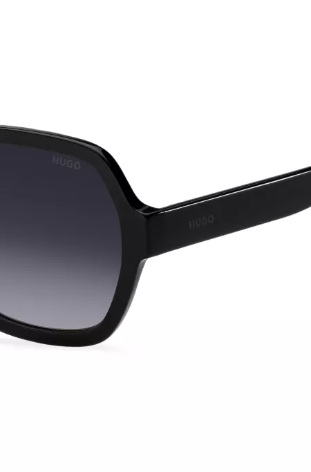 Black-acetate sunglasses with logo details