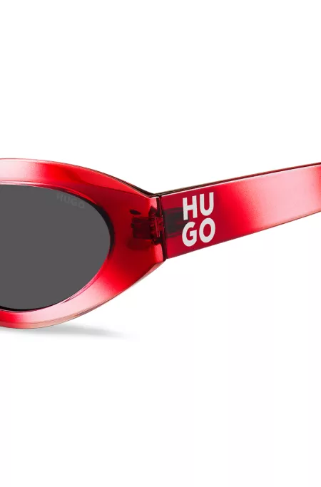 Red sunglasses with stacked-logo temples